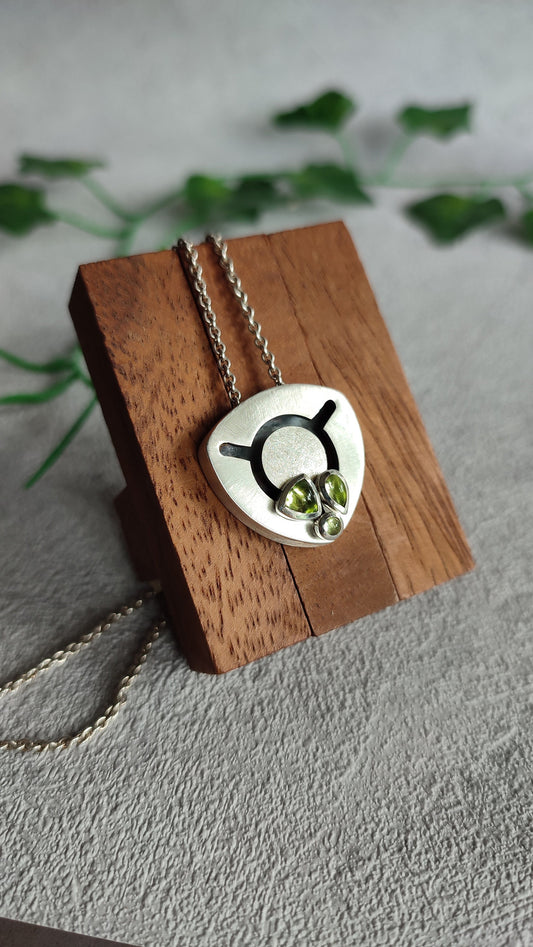 Kinetic Pendant with moving Peridot gemstones - "Sliding Gems"