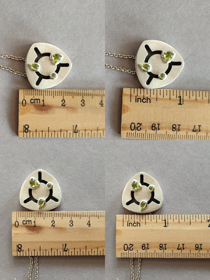 Kinetic Pendant with moving Peridot gemstones - "Sliding Gems"