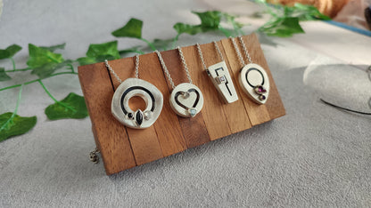 Kinetic Pendant with moving Peridot gemstones - "Sliding Gems"