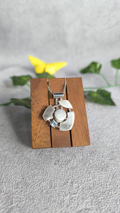 Futuristic spinner Pendant in sterling Silver with Topaz